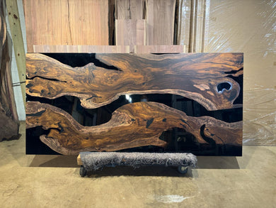 Live edge wood with epoxy resin dining table in modern home