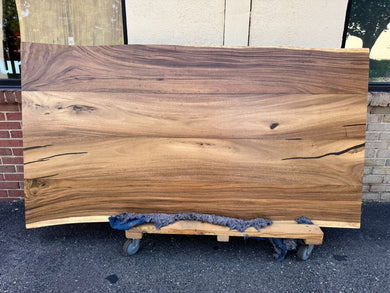 Live edge acacia wood slab dining table top with rich grain patterns and natural edges, ideal for custom furniture and luxury interior design.