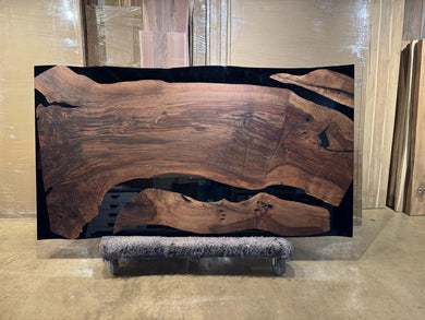 Live edge wood with epoxy resin dining table in modern home