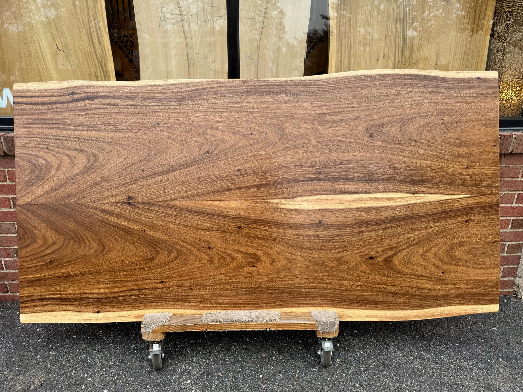 Handcrafted live edge wood dining table made from solid acacia, featuring natural wood grain and rustic modern design – perfect for farmhouse or contemporary dining rooms.