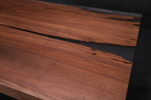 Live edge wood with epoxy resin dining table in modern home