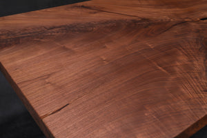Live edge wood with epoxy resin dining table in modern home