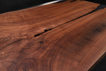 Live edge wood with epoxy resin dining table in modern home