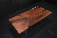 Live edge wood with epoxy resin dining table in modern home