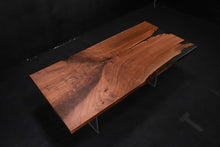 Live edge wood with epoxy resin dining table in modern home
