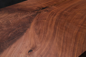 Live edge wood with epoxy resin dining table in modern home