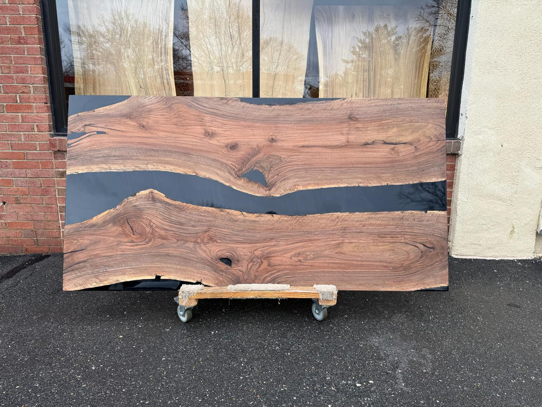 Live edge wood with epoxy resin dining table in modern home