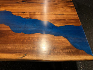 Live edge dining table with river epoxy