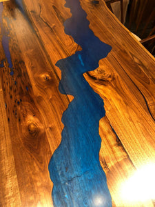 Live edge dining table with river epoxy