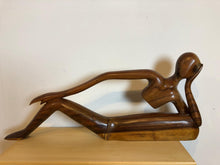 Relaxed abstract wood sculpture