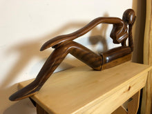 Relaxed abstract wood sculpture