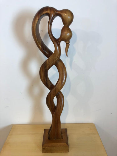 Kissing couple abstract wood sculpture