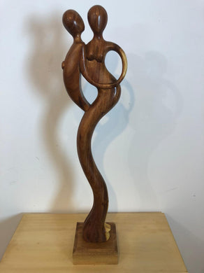 Dancing couple abstract wood sculpture