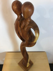 Dancing couple abstract wood sculpture