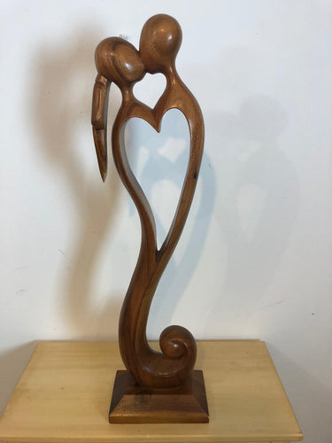 Kissing couple abstract wood sculpture