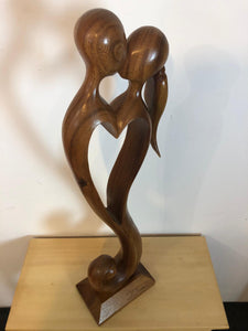 Kissing couple abstract wood sculpture