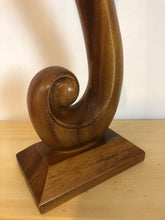 Kissing couple abstract wood sculpture