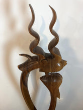 King and queen abstract wood floor sculpture