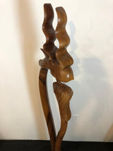 King and queen abstract wood floor sculpture