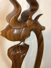 King and queen abstract wood floor sculpture