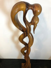 Kissing couple abstract wood floor sculpture