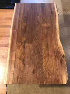 Live edge walnut wood coffee table with trapezoid metal legs