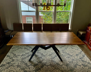 Walnut dining table with mantis base