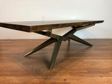 Live edge walnut coffee table with metal base in brass finish