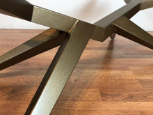 Live edge walnut coffee table with metal base in brass finish