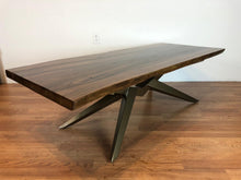 Live edge walnut coffee table with metal base in brass finish
