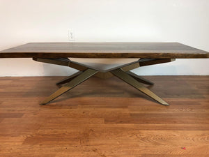 Live edge walnut coffee table with metal base in brass finish