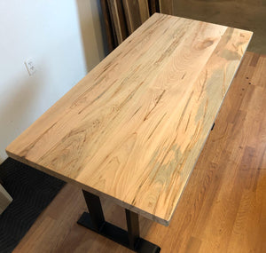 Wormy maple wood dining table