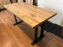 Wormy maple wood dining table