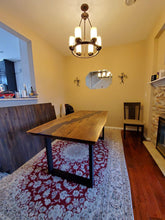 Live edge acacia wood dining table with epoxy