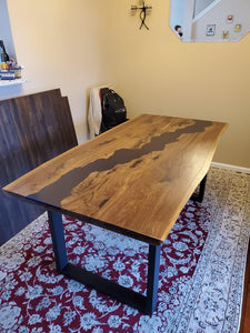Live edge acacia wood dining table with epoxy