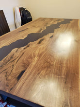 Live edge acacia wood dining table with epoxy
