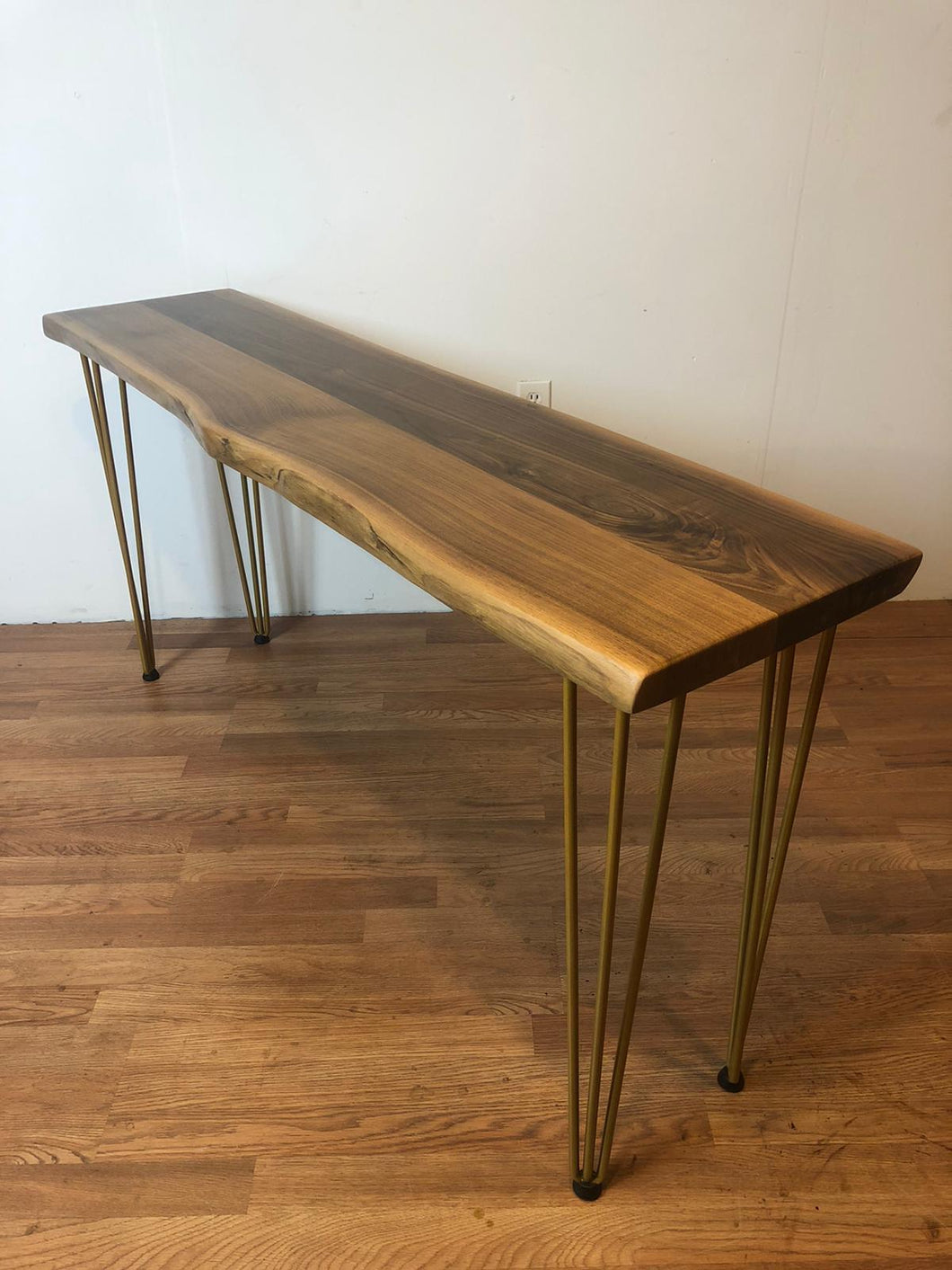 Live edge walnut console table with gold hairpin legs