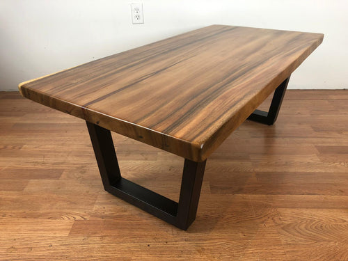 Acacia coffee table with trapezoid metal legs