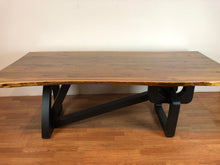 Live edge wood dining table with art deco base