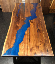 Live edge dining table with river epoxy