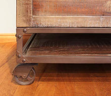 Urban industrial coffee table on wheels with lift top