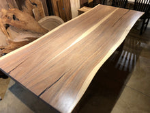 Live edge acacia wood dining table with natural rubio finish