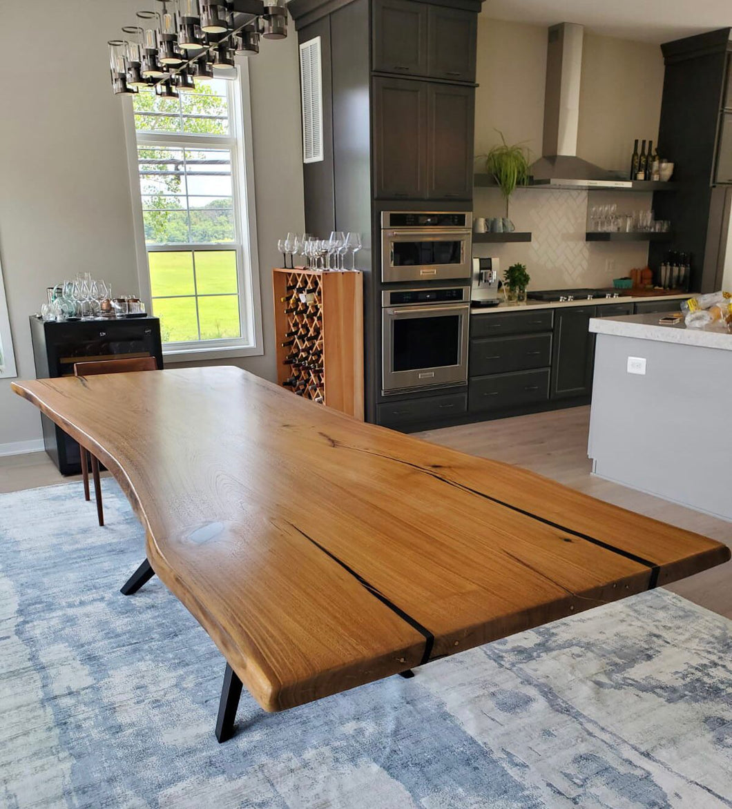 Live edge walnut wood dining table with mantis metal base