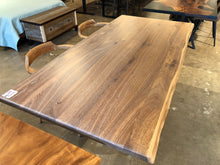 Live edge walnut table with X pedestal contemporary modern metal base